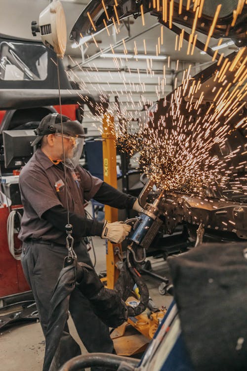 Welder Working at Workshop