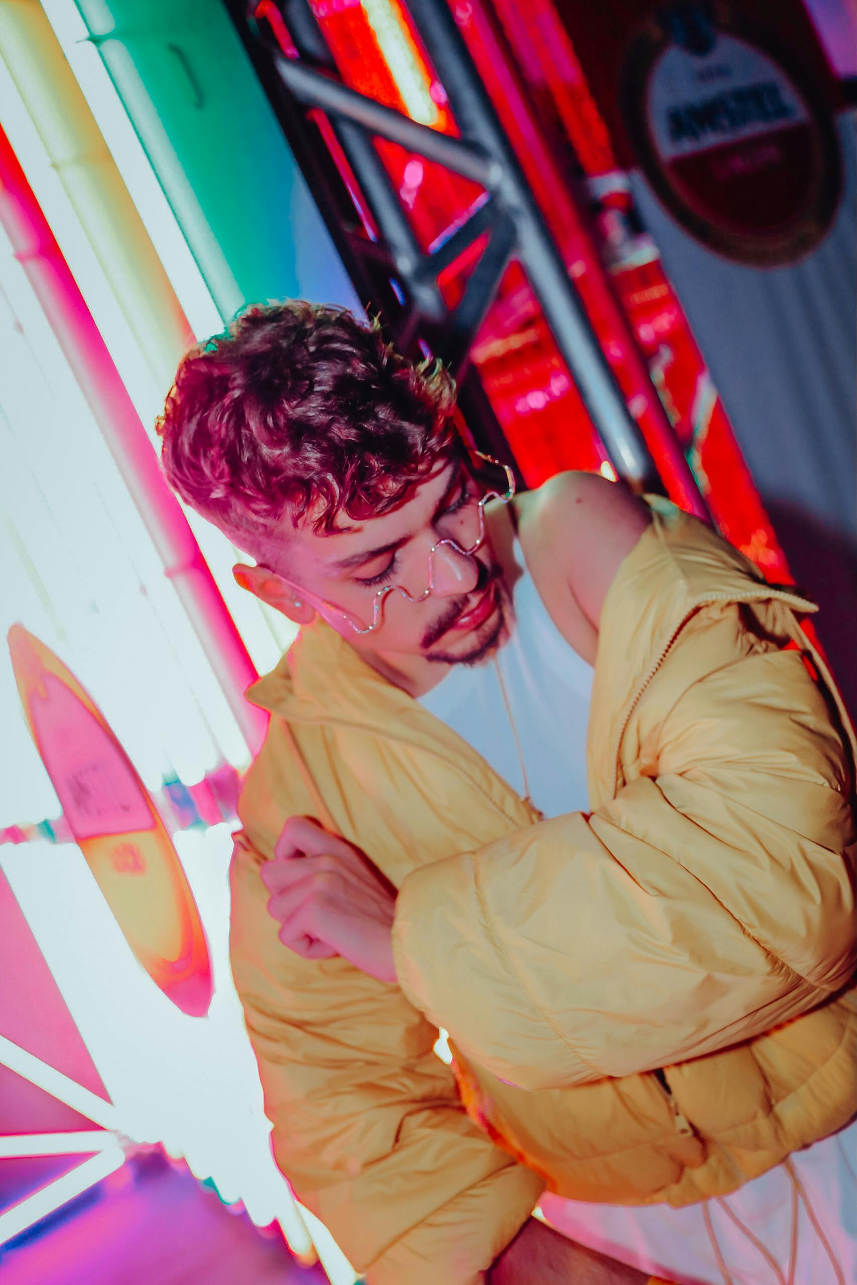 Man in Neon Green Jacket Standing near the Traffic Light · Free Stock Photo