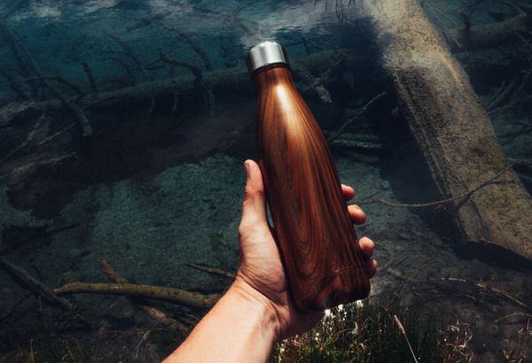 Outdoor camping water container and refill setup