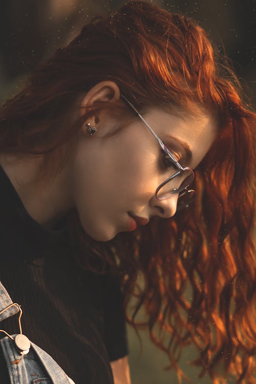 Free Close-up View of Redhead Woman with Eyeglasses Stock Photo