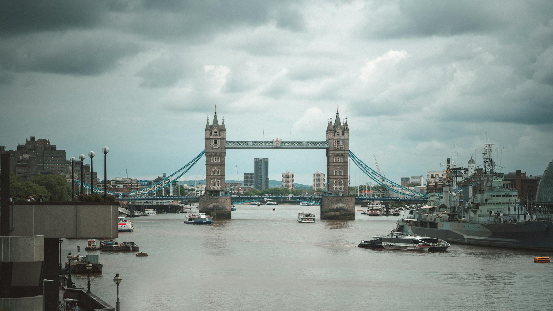 A scenic view of Tower Bridge spanning the River Thames in London, United Kingdom.