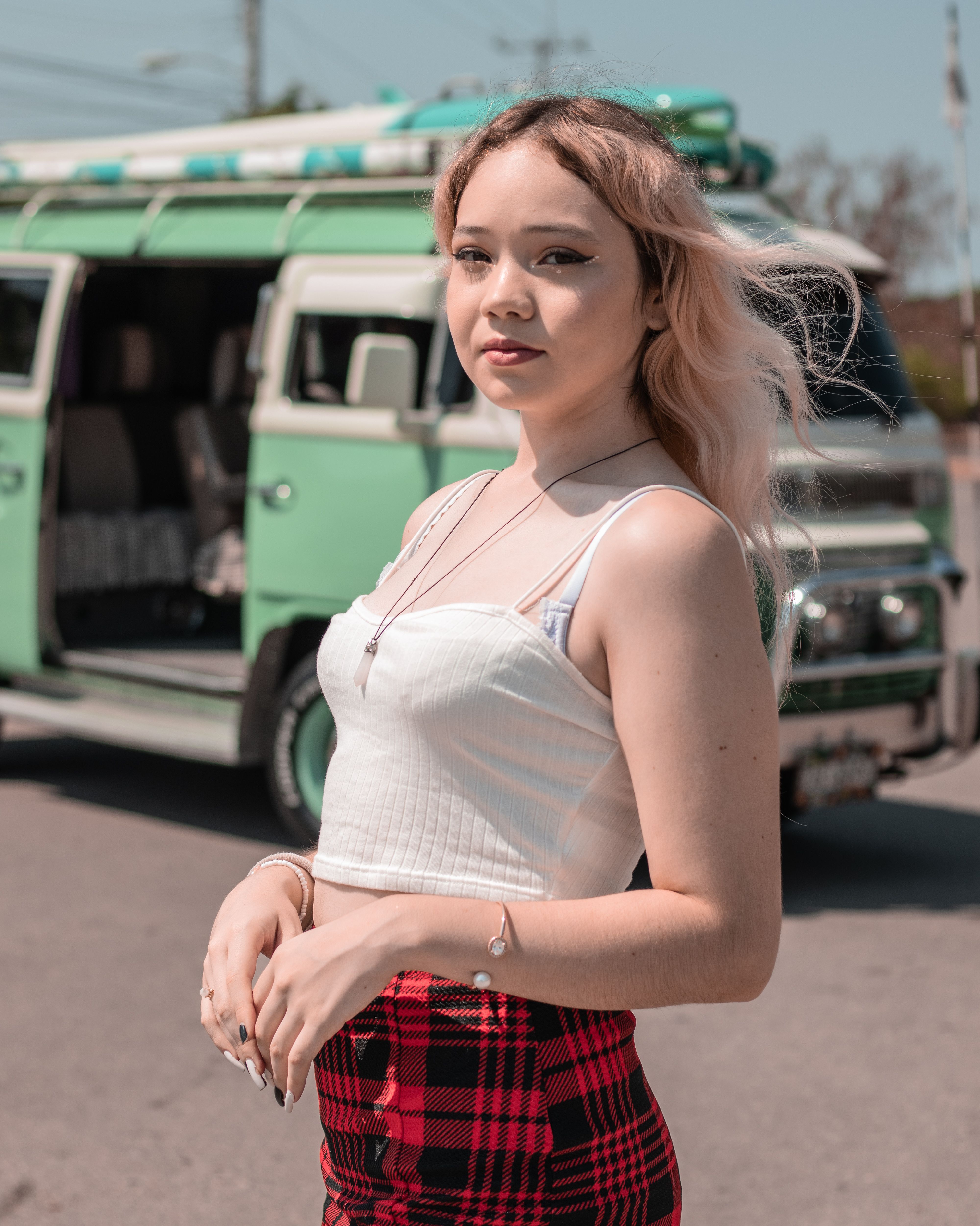 A Woman Wearing Crop Top and Denim Jeans · Free Stock Photo
