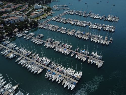 Free Stunning aerial view of a marina filled with sailboats in Turkey, showcasing a tranquil harbor setting. Stock Photo