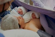 Woman with her Newborn Twins on a Hospital Bed