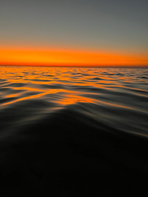Free Body of Water During Sunset Stock Photo