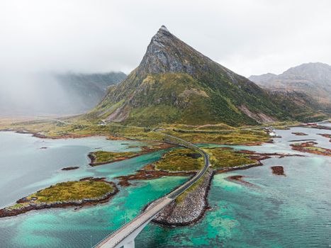 Green and Gray Mountain Beside Body of Water
