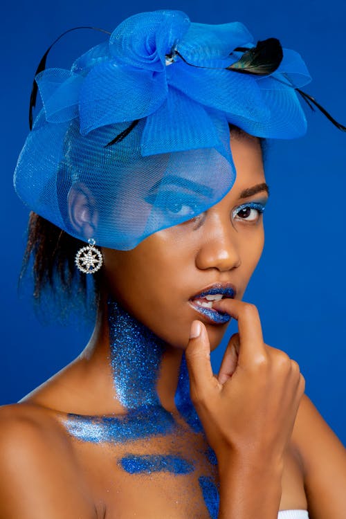Woman with Blue Glitter and Accessory