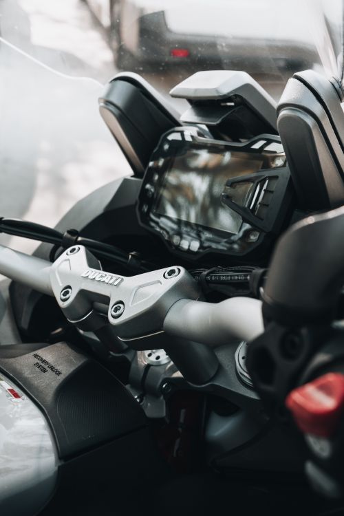 Free Detailed view of a motorcycle's dashboard and handlebars, showcasing technology and design. Stock Photo