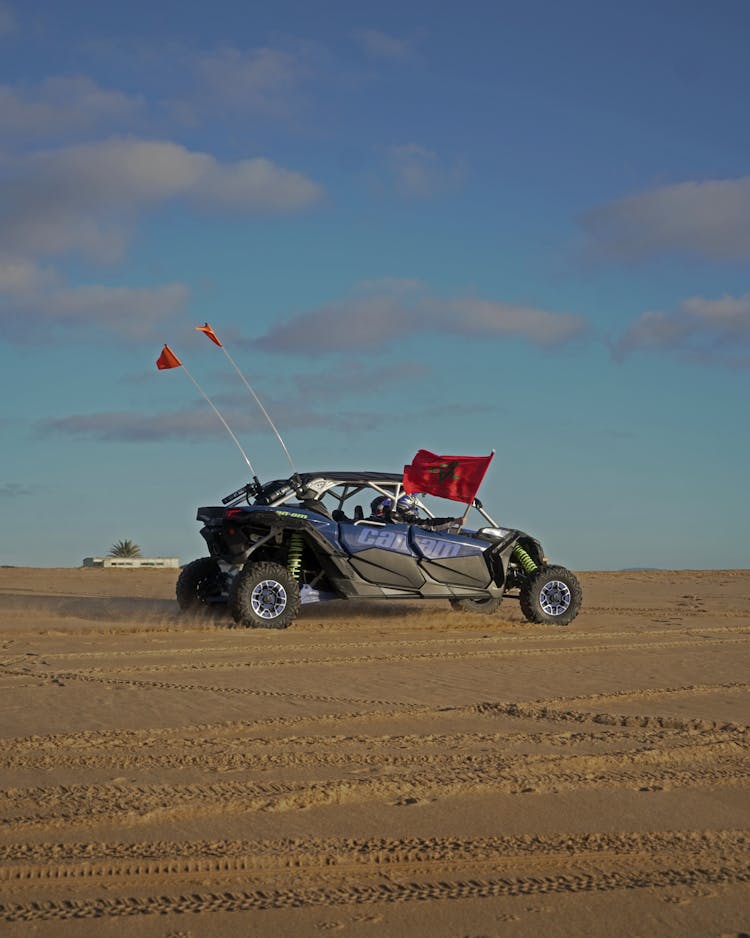 Blue Dune Buggy On Desert Land