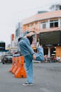 Woman in Denim Jacket Posing on Street
