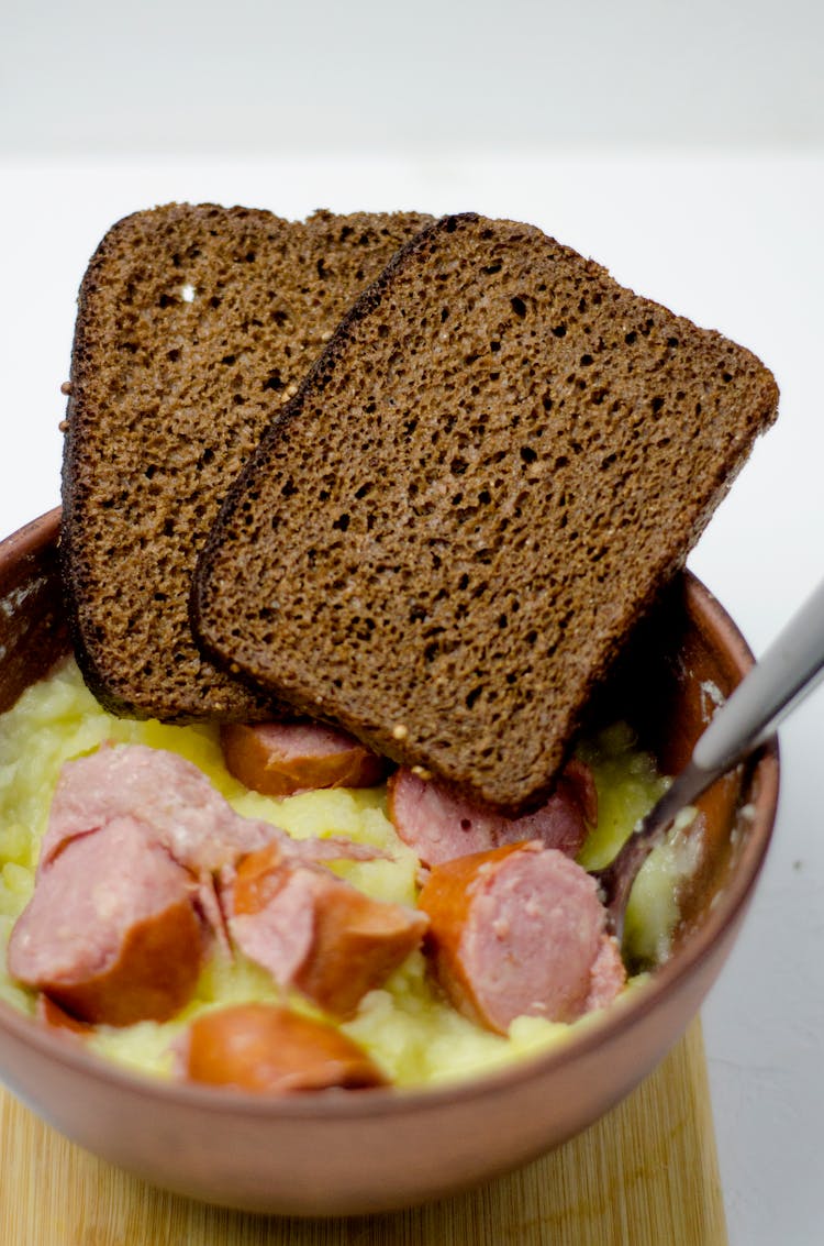 Soup With Sausage And Brown Bread 