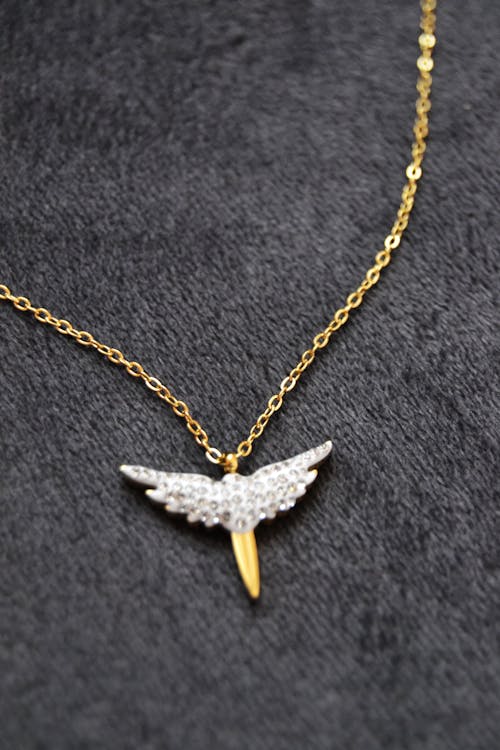 Free Gold Chain Necklace with Butterfly Pendant  Stock Photo