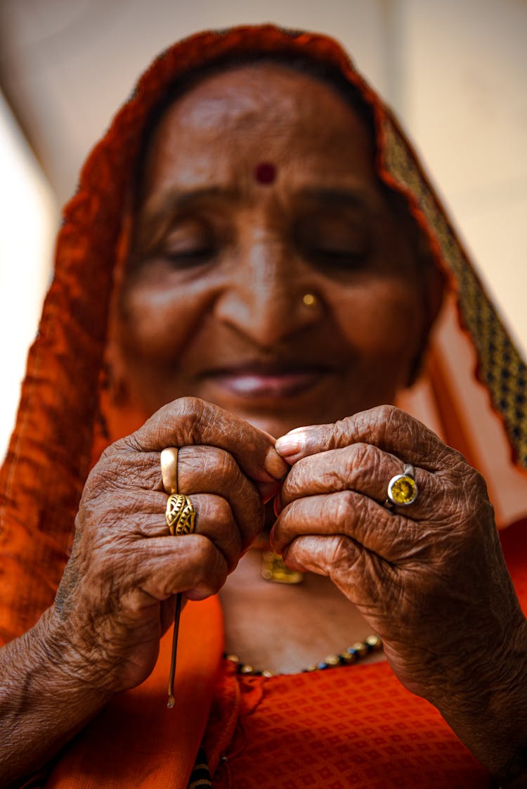 Close-up View Of Elderly Woman Hands