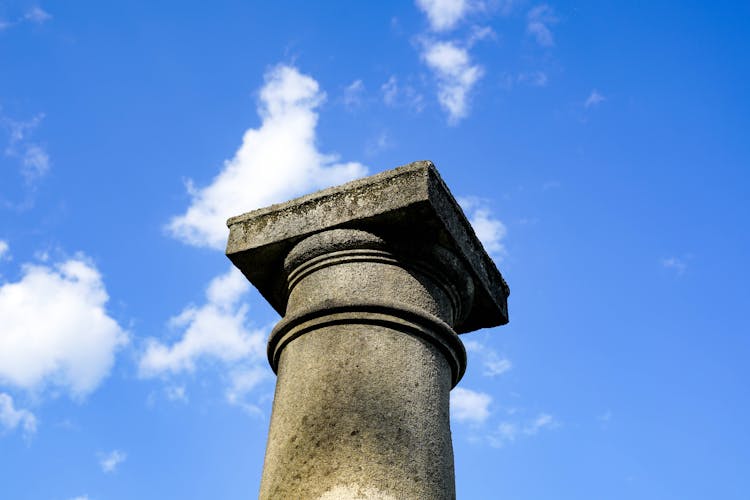 Ancient Column Against Sky