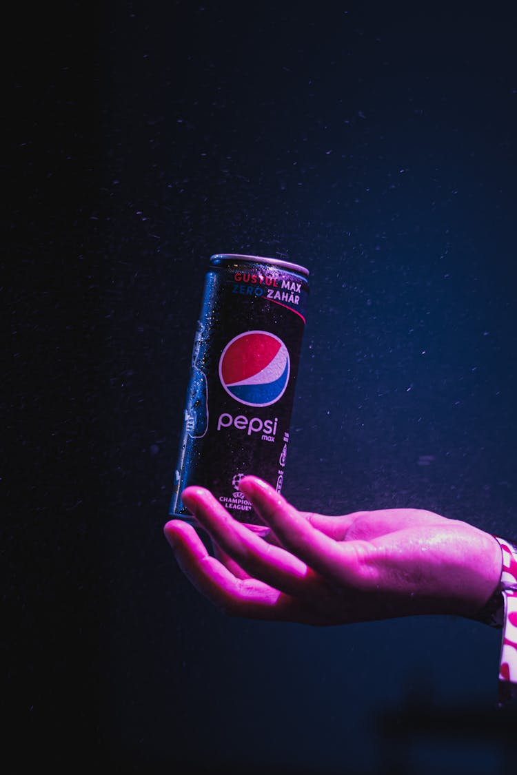 Hand Holding A Can Of Pepsi 