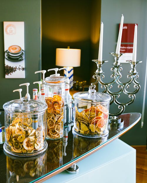 Glass Jar with Dried Fruits on a Bar Counter