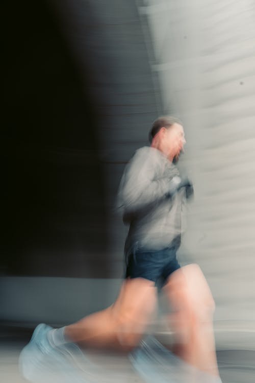 A Blurry Shot of a Man Running