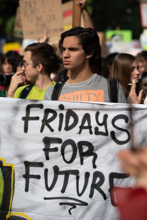 Man Holding a Banner