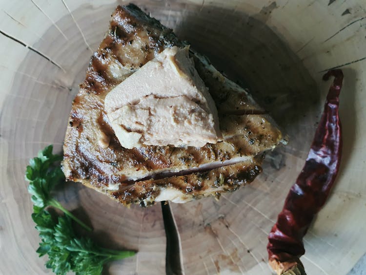 Fish Dinner On A Plate Made Of Wood