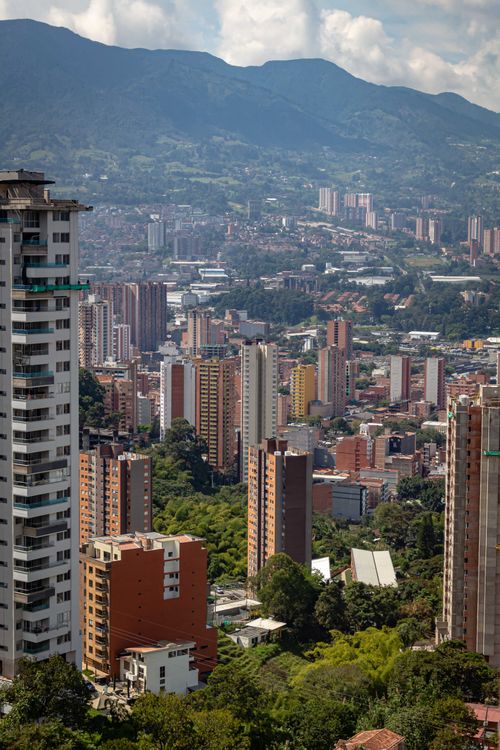 Free A stunning aerial cityscape of Medellín, Colombia framed by mountain ranges. Stock Photo