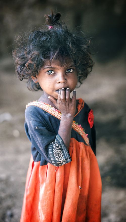 Free Beautiful portrait of a young girl in vibrant traditional attire in Sindh, Pakistan. Stock Photo