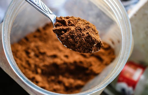 Free Selective Photo of Brown Powder on Stainless Spoon Stock Photo