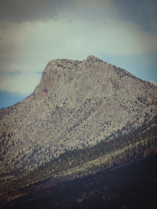 Gray and White Mountain Under Cloudy Sky