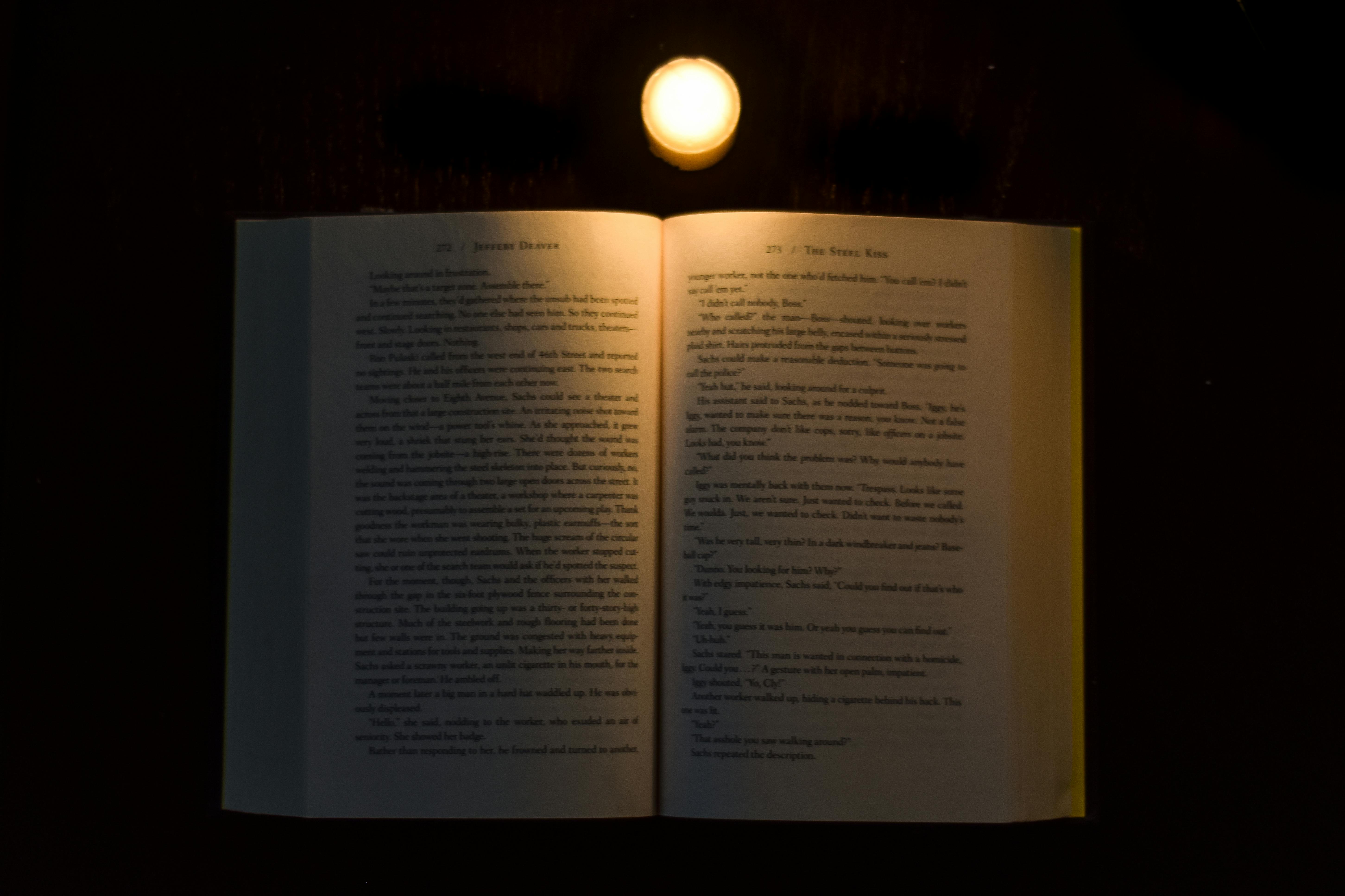 Free stock photo of Simple Book Lit By Candle