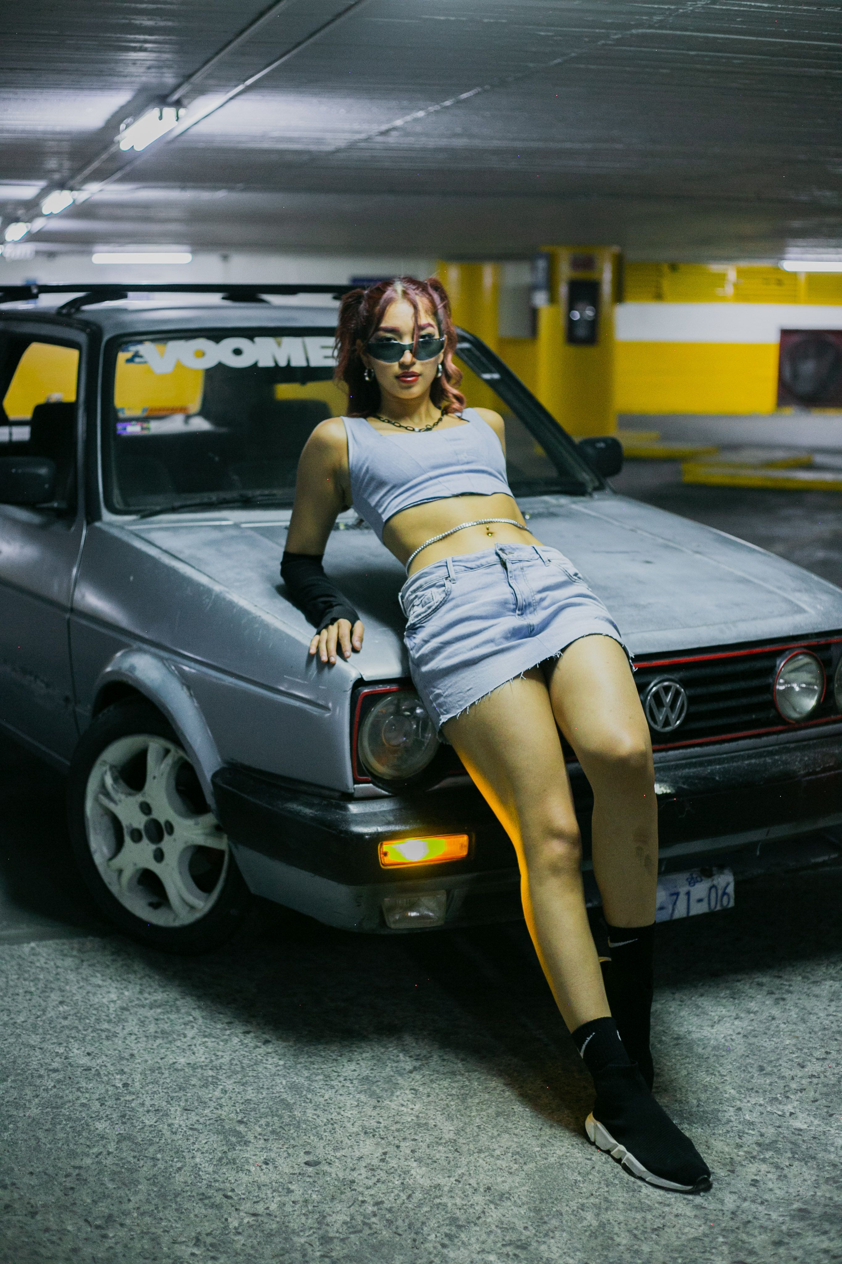 Portrait of a Woman Standing by a Car · Free Stock Photo