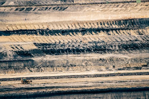 Excavator on Massive Construction Site