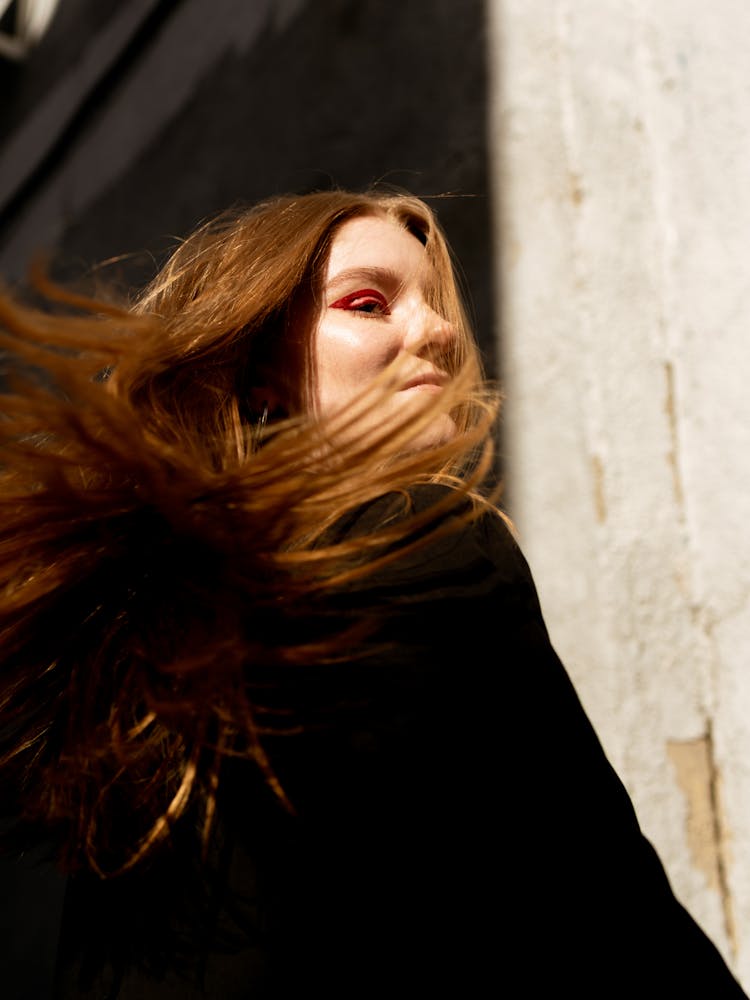 A Woman Flipping Her Hair