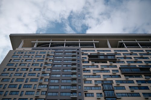 Low Angle shot of a Modern Apartment Building in City 