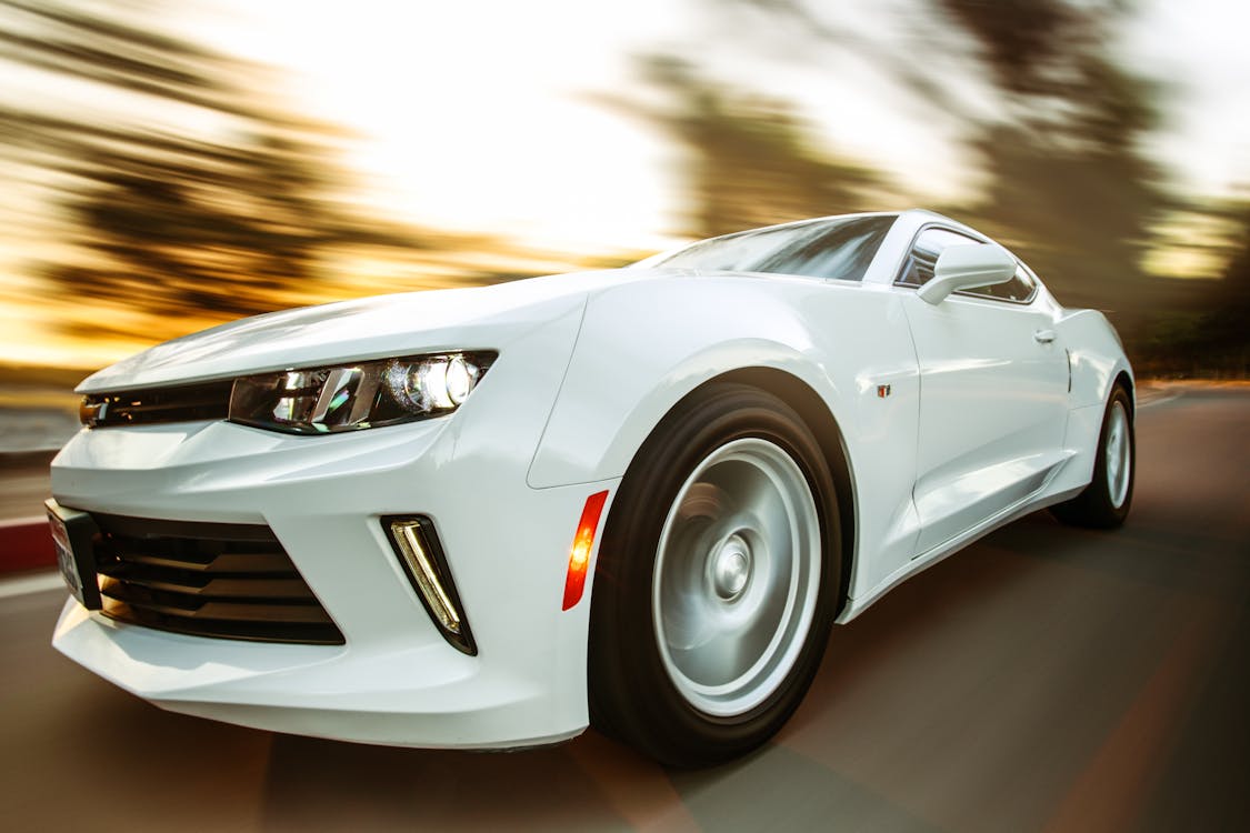 Free Close-Up Photography of White Chevrolet Camaro Stock Photo