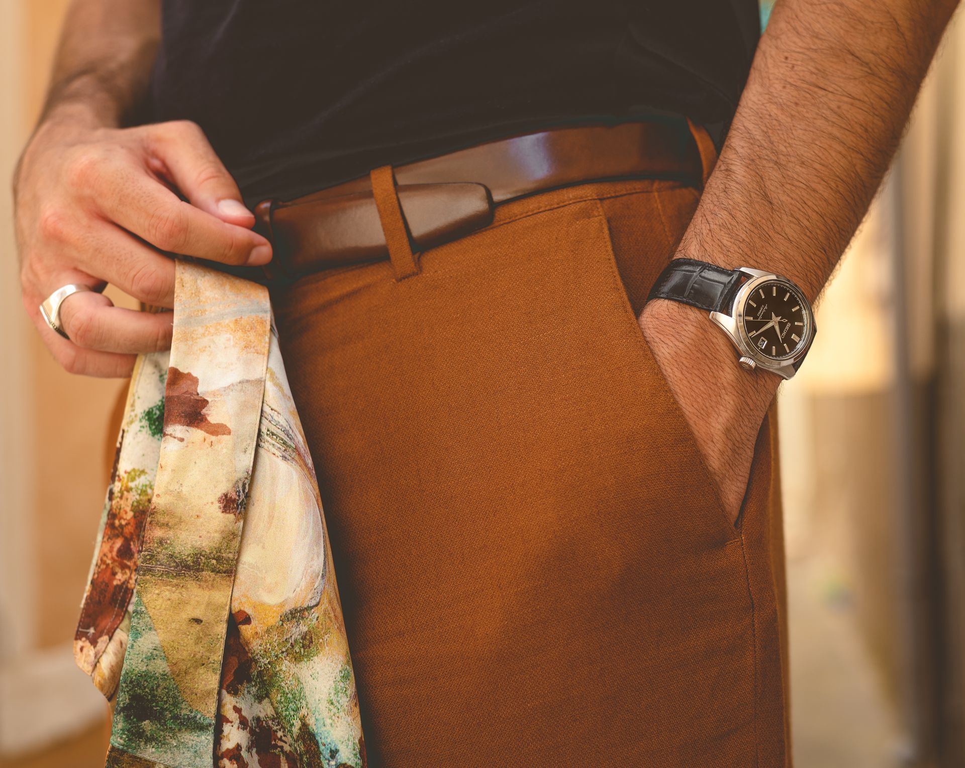 A Close-Up Shot of a Man's Hand Inside His Pocket