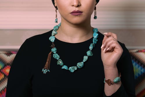 Woman Wearing a Necklace and a Bracelet