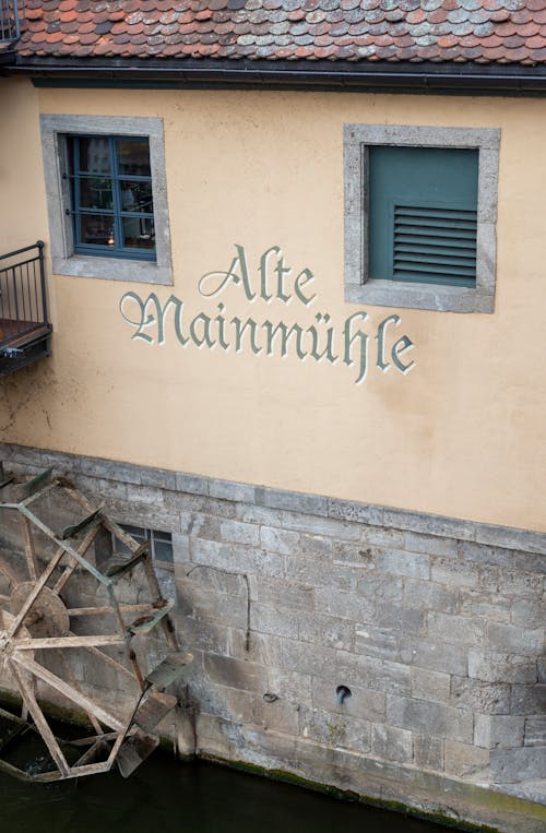 Facade of the Gasthaus Alte Mainmühle in Würzburg, Germany	