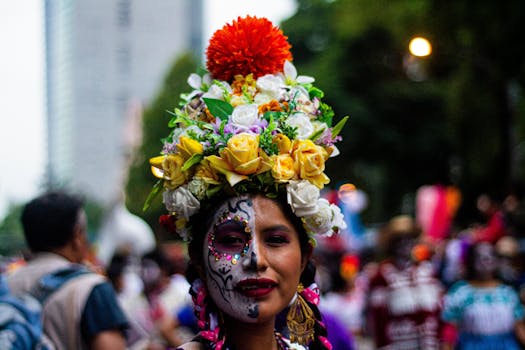 Woman with Catrina makeup and flower crown at Dia de los Muertos festival in Mexico City.