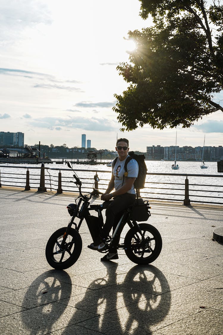 A Man Riding An Electric Motorcycle