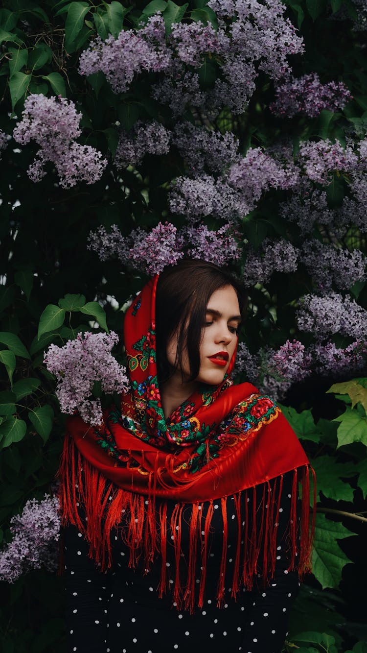 Woman In Red Headscarf Standing Under Elderberry Tree