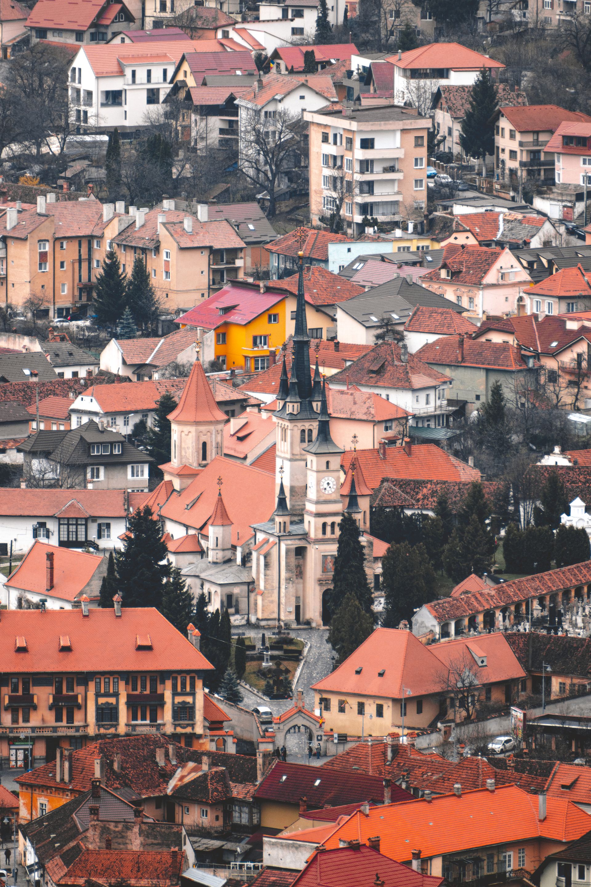 Brașov old town and St Nicholas Church beneath the Carpathians.