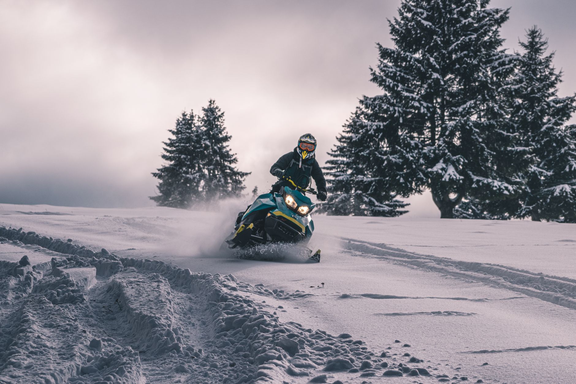 Snowmobile being prepared for winter transport — Canadian sled hauling service