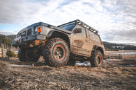 Nissan Patrol covered with mud
