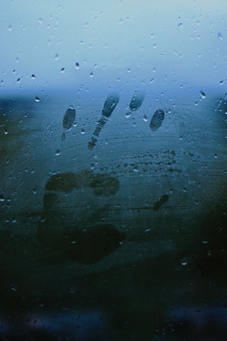 Hand Mark On A Moist Glass