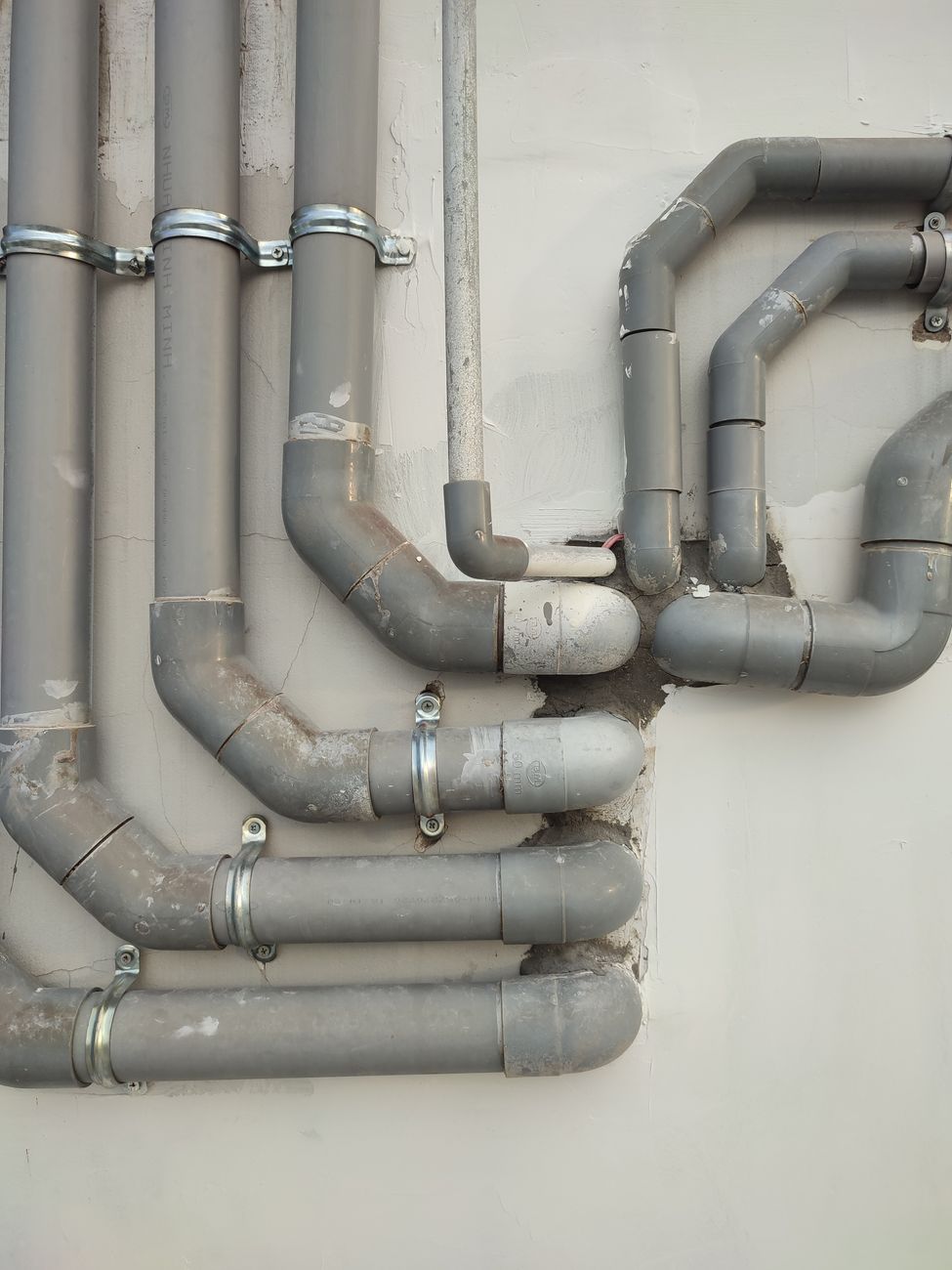 Central heating system being inspected for leaks in a London home