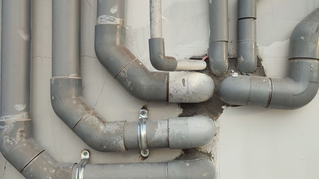 Drain and vent stacks on a building serviced by Advantage Build and Design