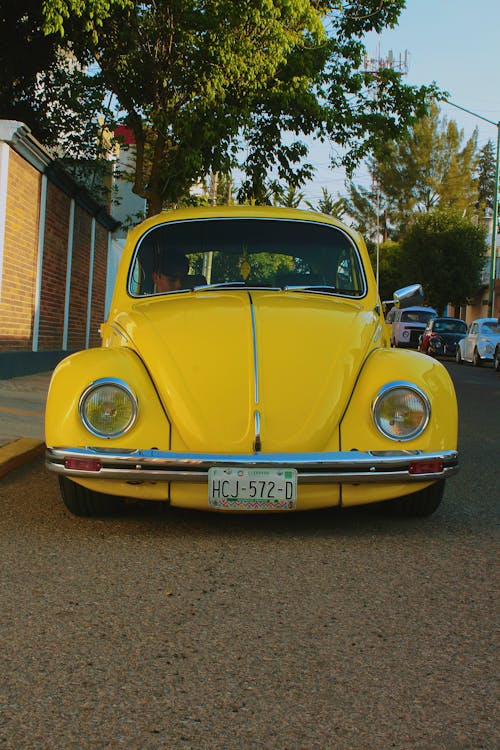 Yellow Volkswagen Beetle Parked on the Street