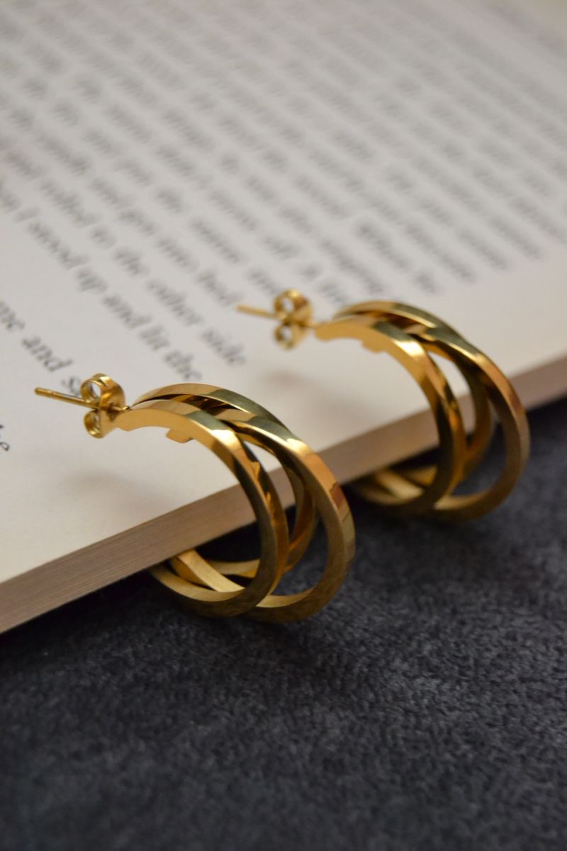 Gold hoop earrings close up