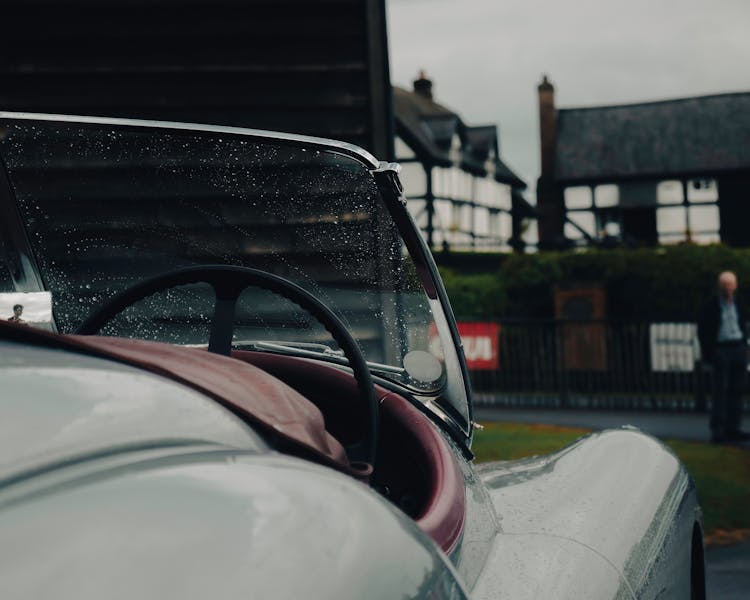 Wet Convertible Car Parked On A Street