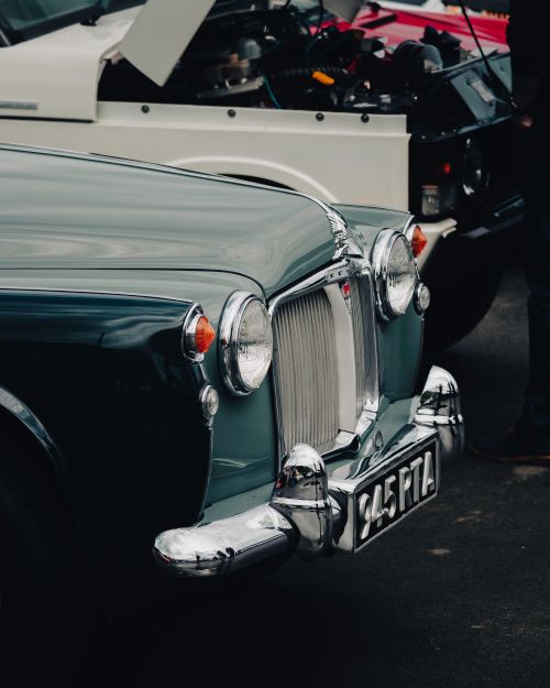 Free Close-up of a vintage British car showcasing classic design elements. Stock Photo
