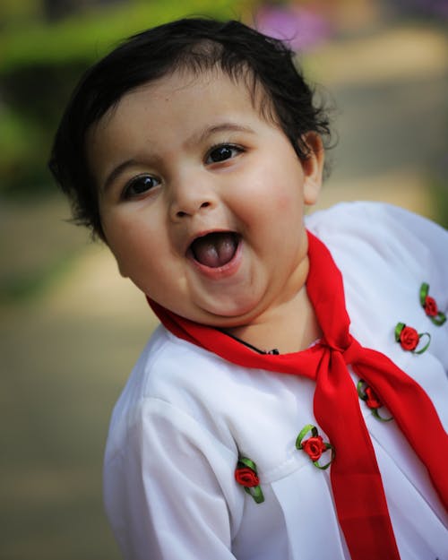 A Cute Baby Girl in White Shirt